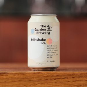 The Garden Brewery Milkshake IPA beer cans with blue, white and pink-oragne watercolour artwork.